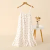 Gonna a bretelle in cotone bianco