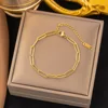 bracelet chaîne croix en or-16