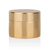 gold jar with gold cap