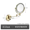 Gold-colored makeup mirror with light