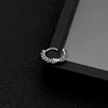 E047-Silver  (there are ear holes an earring)