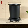 Résine - noir de jais - diamètre 19,8 cm - hauteur 22 cm avec socle