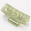 Pinza para el cabello verde fluorescente