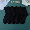 50 pares de medias negras