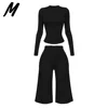 Completo Nero con Maglia a Maniche Lunghe e Pantaloni Capri