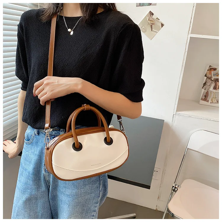Los 12 bolsos para llevar a diario que serán tendencia esta primavera 2021:  de rafia, estilo 'shopping' o sofisticados | Vanity Fair