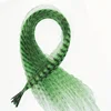 Paquete de 10 palitos para el cabello verdes.