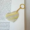 8 boucles dorées à rayures jaunes