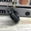 Llavero Cabeza de Dragón - Seda Negra y Plata