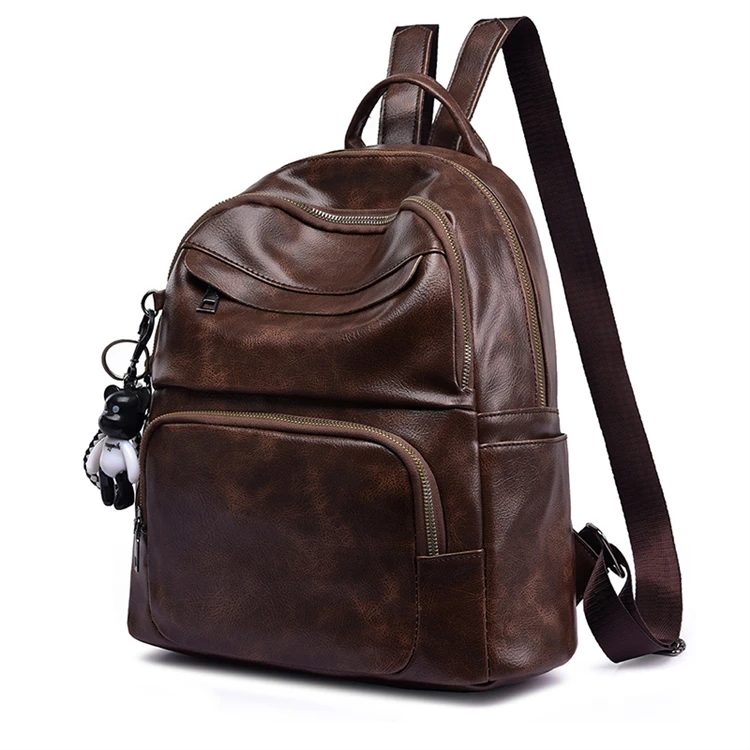 chain strap mini backpack Madein. mini backpack with chain detail in black satin