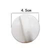 White knob on washing machine
