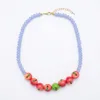 collana di mele blu