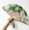 10 petits papillons à os brun et face verte