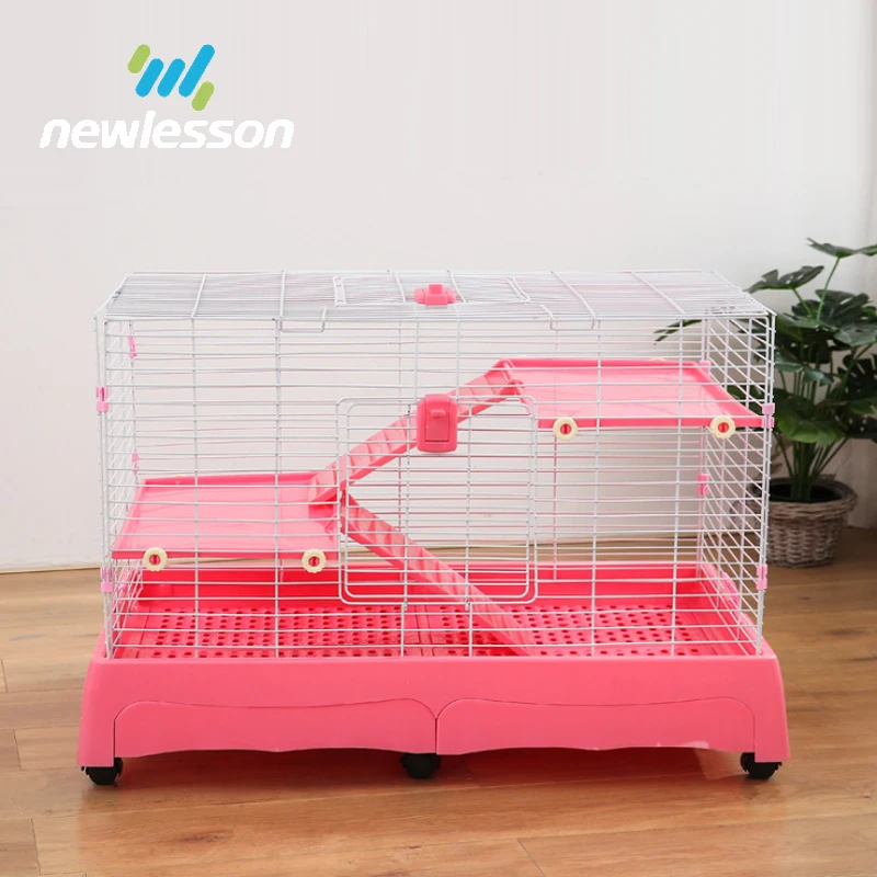 pink indoor rabbit cage