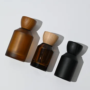 High quality round shape amber black frosted 30ml 50ml 100ml empty perfume bottle customize with wooden lid