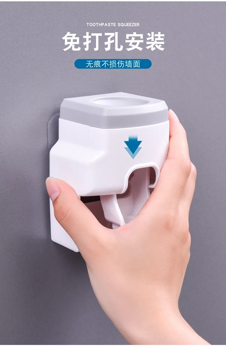 Bathroom washing table automatic toothpaste squeezer toothbrush holder wall mounted toothpaste squeezer for lazy people supplier