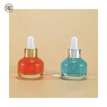 Portable Cute Skin Care Packaging Custom Ball Shape 30ml Clear Perfume Bottle Elegant Essential Oil Bottle Glass