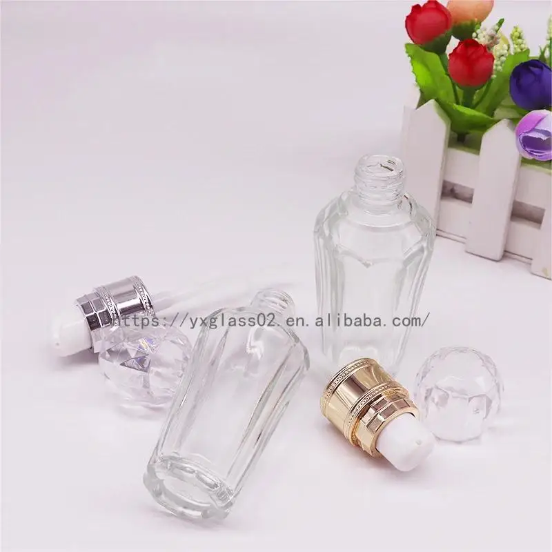 Factory Luxury cosmetic liquid-diamond shape foundation glass bottle make up container with squeeze pump 30ml50ml manufacture