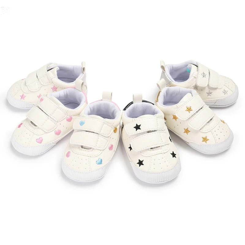 white hard sole baby shoes