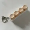 4 teclas marrón claro