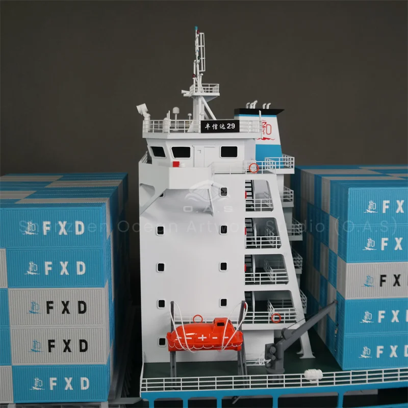 Crafted by Haiyifang, this hyper-realistic container ship model is tailor-made for marine department exhibitions and hall displays. Boasting 1:200 scaled precision, every detail from container locks to radar systems is perfectly replicated with aviation-grade materials and handcrafted techniques. Support custom design based on your drawings. Ideal as a premium exhibition highlight or a sophisticated ornament to showcase your marine industry strength.Amber@vesselmodel.com Tel: +86 18038048785