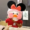 Minnie with red sweater and brown bag