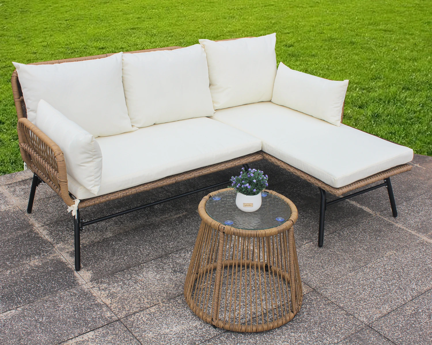 beige rattan garden sofa