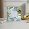 Green flowers with no words on the window