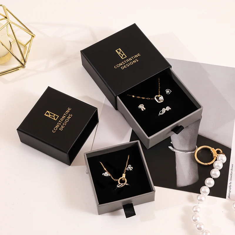 2024 A1 Simple Black Elegant Custom Logo Printed Paper Drawer Jewelry Box Unique Packaging Pendant Stud Ring Earring Gift Box supplier