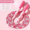 Regular pink bamboo jump rope - transparent bag packaging