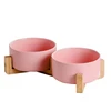 Pink double bowl with wooden frame