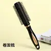 Black and yellow curly hair comb