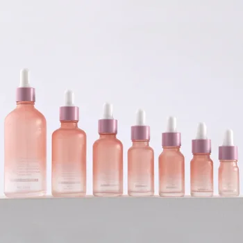 Wholesale D18 essential oil glass bottles frosted pink dropper bottle rose gold dropper for skincare Essential Oil Glass bottles