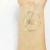 Gold temporary tattoo