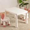 White table, 2 red rabbit chairs, and free anti-slip pads.