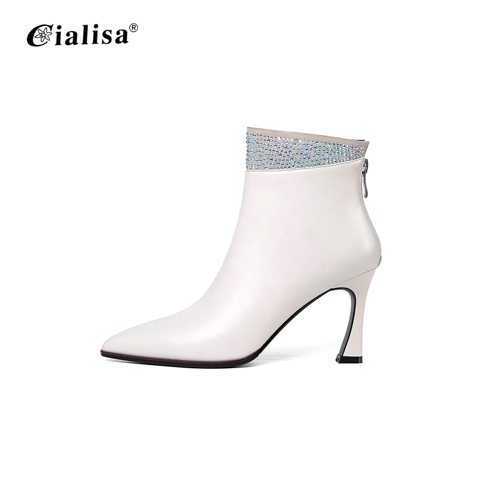 white leather pointed boots