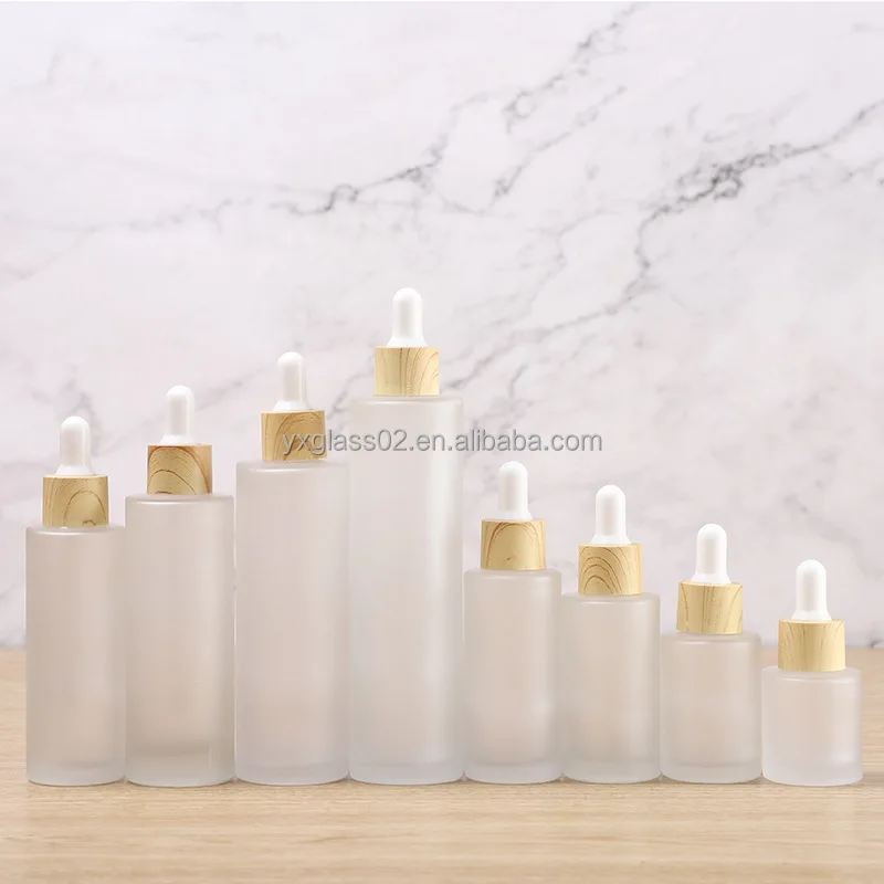 Frosted Essential Oil glass bottle serum glass bottle Flat Shoulder Dropper bottle with Plastic environmentally wood grain ring factory