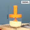 transparent bottle with orange cap and spoon