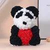 Panda hugging red hearts