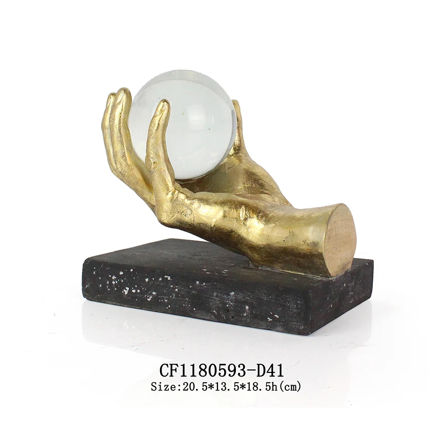 Resin hand with crystal ball home and table decoration factory