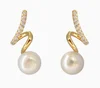 Or, perle et zircon