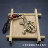 Gecko (Black auspicious cloud beaded clasp)