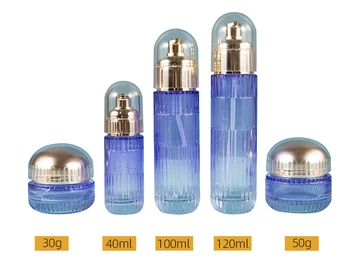 Customizable purple skin care kit 100ml 30ml face cream essence liquid glass vacuum packaging airless lotion pump bottle