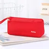 Red pencil case with logo