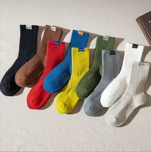 Fashion Letter Label Sewn Cotton Cushion Socks Custom Design Crew Terry Basketball Socks for Men Wholesale