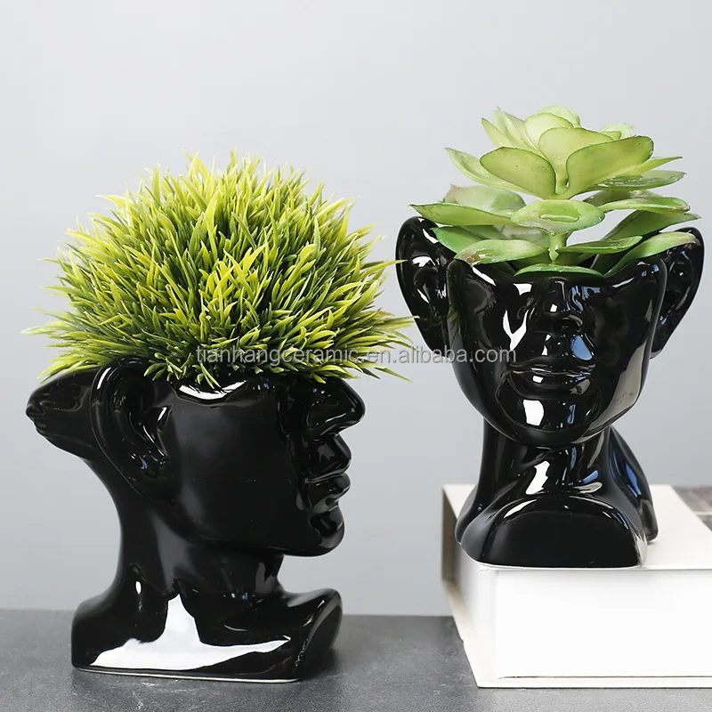 Modern Creative head ceramic black white face home decoration flower arrangement vase.jpg