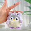 Pingüino travesti morado + cadena de cuentas