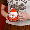 Red santa claus in colorful box