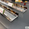 ชั้นวางใสพร้อมตัวดันสีอำพันลายกระ