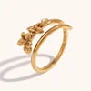 Anillo abierto doble de tres flores